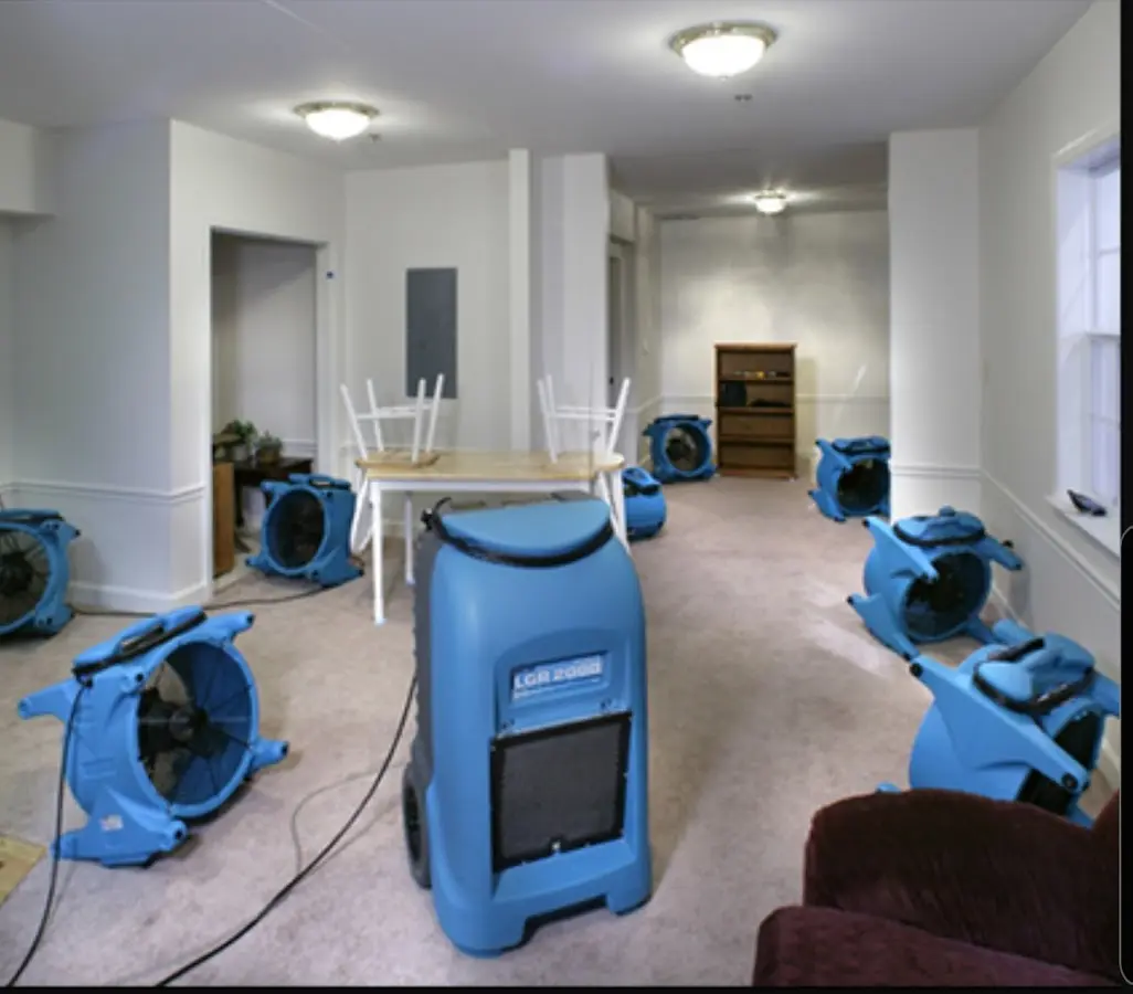 Air movers and dehumidifier setup for Water Damage Restoration in Mercedes